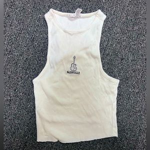 Brand new, medium, super cute cropped Nashville tank top. Never been worn